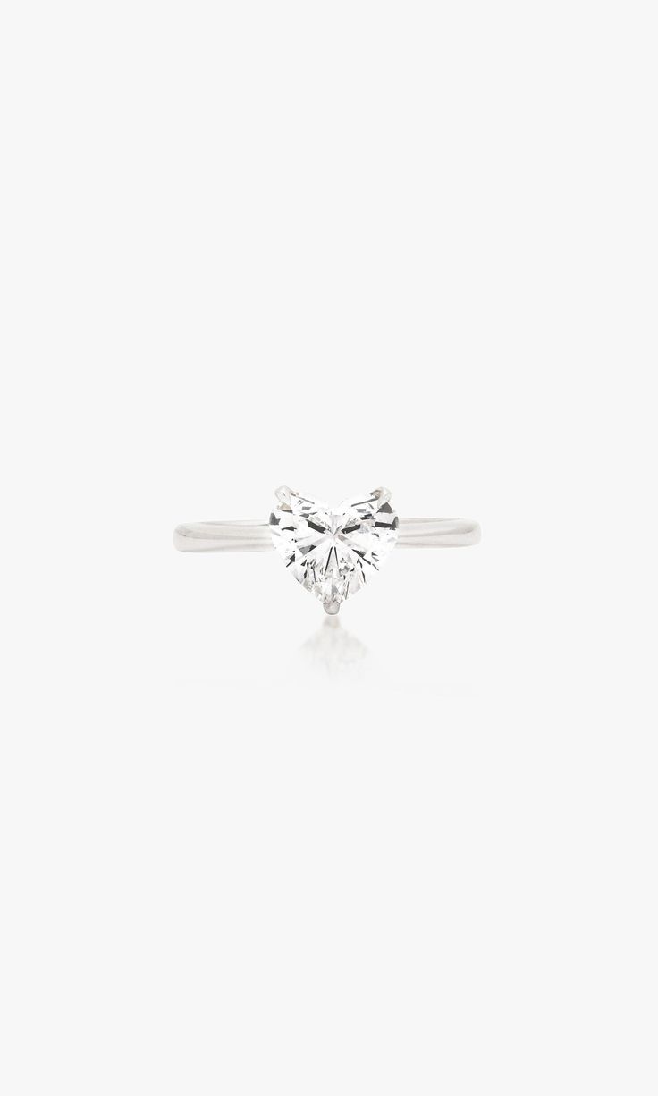 Open your heart to this timeless 14K white gold, 1.59 carat diamond ring. Adorning 14K white gold is a gorgeous sustainable, lab-grown, heart cut diamond, nestled in a 3-prong setting. Featuring an E/F color and VS clarity, this stackable piece shines at every angle. Part of our "Love Yourself" series, this statement ring is perfect for self-gifting, exuding the love you show for yourself and others. *Note: 7 day return for store credit only. No exchanges allowed. Product Details 1.59 Carat Hear Heart Cut Ring, Bridal Wardrobe, Streetwear Chic, Fine Jewelry Collection, Lace Detail, Timeless Beauty, Prong Setting, Lab Grown Diamonds, Heart Ring