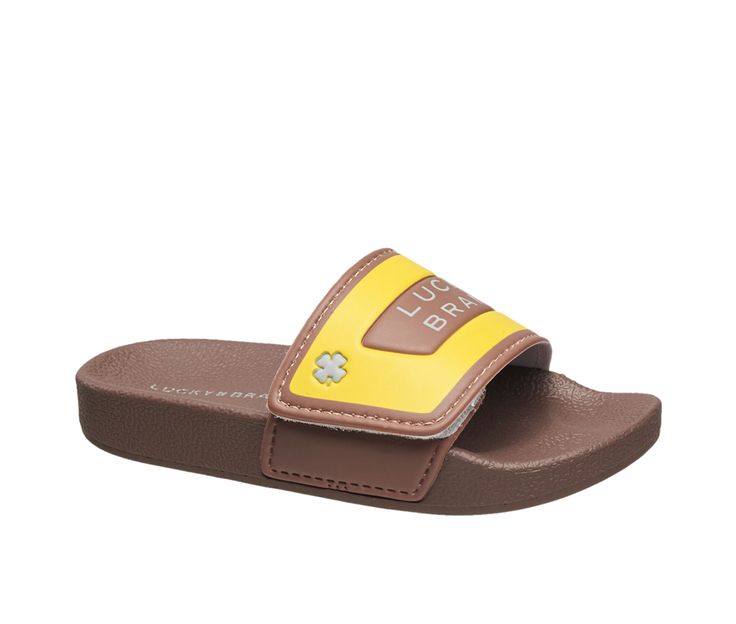 Adjustable upper band for customizable fit. Flexible outsole. Perfect for the pool, beach or every day wear. Man made upper with Lucky Brand detailing, Slip on for easy entry, Adjustable velcro strap, Round open toe, Flat heel, Standard contoured footbed, EVA outsole | Boys' Lucky Brand Mitch Sport Slides Sandals in Brown Size 13 - Little Kid Boys Leather Sandals, Boys Sandals, Pool Beach, Slides Sandals, Shoe Carnival, Men Boys, Velcro Straps, Mens Sandals, The Pool