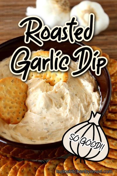 roasted garlic dip with crackers in a bowl