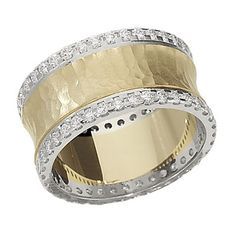 two tone gold and silver ring with white diamonds on the inside, set in 18k yellow gold