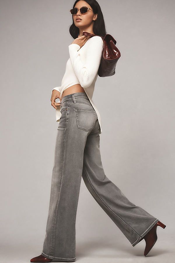 Denim, decoded: This fall, we’re digging denim in every corner of our closet – especially this high-rise, wide-leg pair by RE/DONE, made from comfort stretch fabric. | Mid-Rise Wide-Leg Jeans by RE/DONE in Grey, Women's, Size: 29, Cotton at Anthropologie Mid-rise Wide Leg Pants For Everyday Fall Wear, Everyday Wide Leg Flare Jeans For Fall, Versatile Full Length Jeans For Fall, Versatile Full Length Flare Jeans For Fall, Everyday Wide Leg Jeans For Fall, Trendy Wide Leg Pants For Everyday Fall Wear, Versatile High Rise Flare Jeans For Fall, Everyday Wide Leg Pants For Fall, Chic Denim Wide Leg Pants For Fall