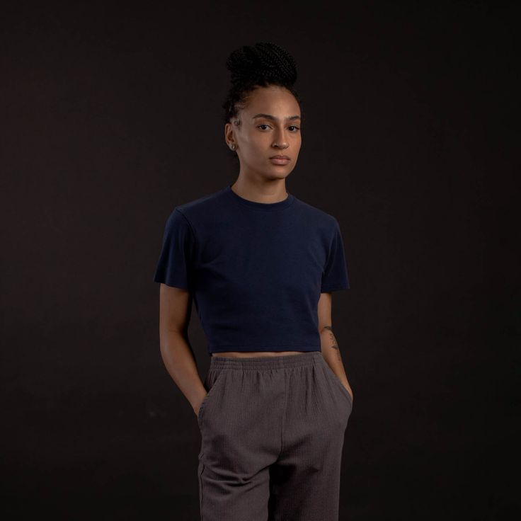 The classic crop top was redesigned for everlasting comfort. Features a fitted collar, reinforced seams, and a slightly tailored body that is cut to hit above the navel. Fitted Basic Crew Neck Crop Top, Basic Fitted Crew Neck Crop Top, Versatile Stretch Cotton Crop Top, Fitted Crew Neck Crop Top, Versatile Fitted Crew Neck Crop Top, Fitted Cropped Solid Color Top, Fitted Basic Crop Top With Short Sleeves, Blue Fitted Cropped T-shirt, Blue Fitted Cotton Cropped Shirt