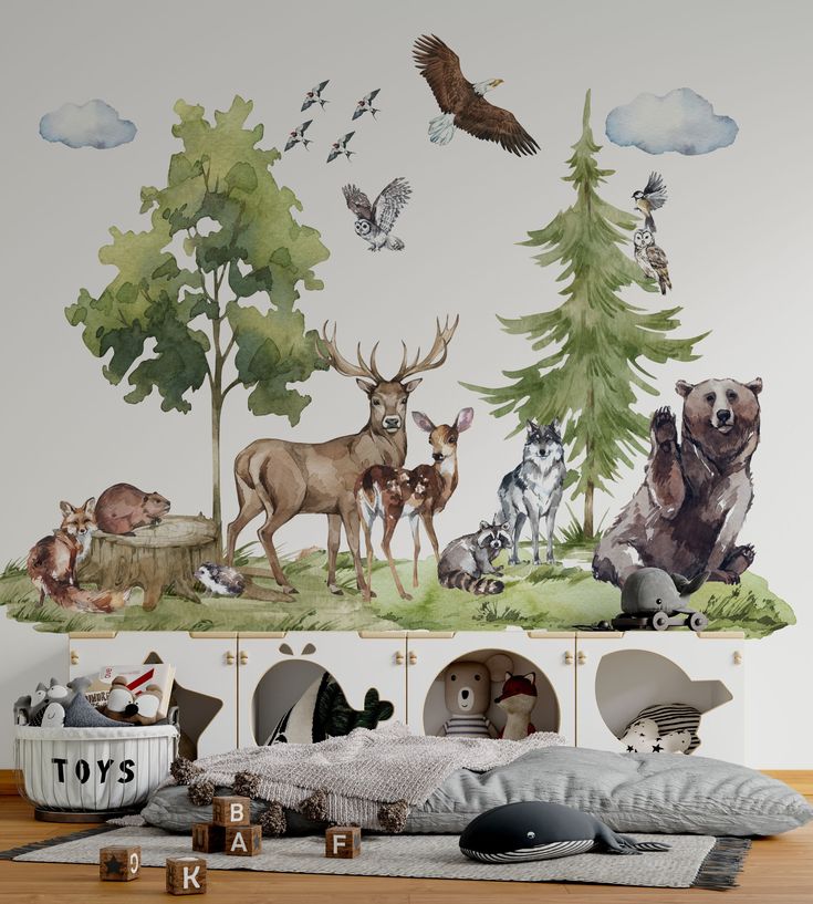 an animal themed wall mural in a children's room