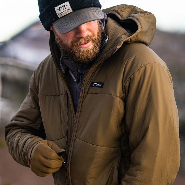 Weather-resistant, breathable synthetic insulation worn as active outerwear in cool and variable conditions or underneath a shell in cold, wet conditions. The first of its kind for Stone Glacier, the Cirque Jacket is the multi-tool of your hunting kit, melding heat and moisture management in an insulating garment. Designed to shine on high exertion hunts through a broad range of temperatures (thank you pit zips), the Cirque also can be worn as an insulation layer. Primaloft® synthetic insulation Functional Long Sleeve Outerwear For Camping, Durable Tactical Windbreaker For Outdoor Activities, Functional Waterproof Windbreaker For Hunting, Outdoor Parka With Fleece Lining, Outdoor Techwear Outerwear With Fleece Lining, Techwear Outerwear With Fleece Lining For Hiking, Techwear Outerwear With Fleece Lining For Outdoor, Khaki Hunting Techwear Outerwear, Durable Khaki Windbreaker For Hiking