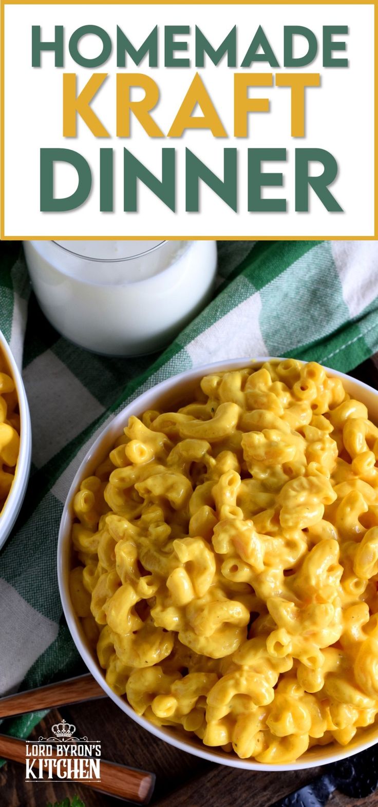 two bowls filled with macaroni and cheese on top of a checkered table cloth