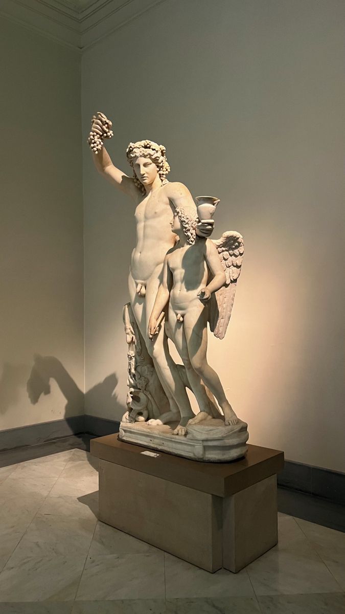 a statue is shown in the middle of a room with white walls and tile flooring