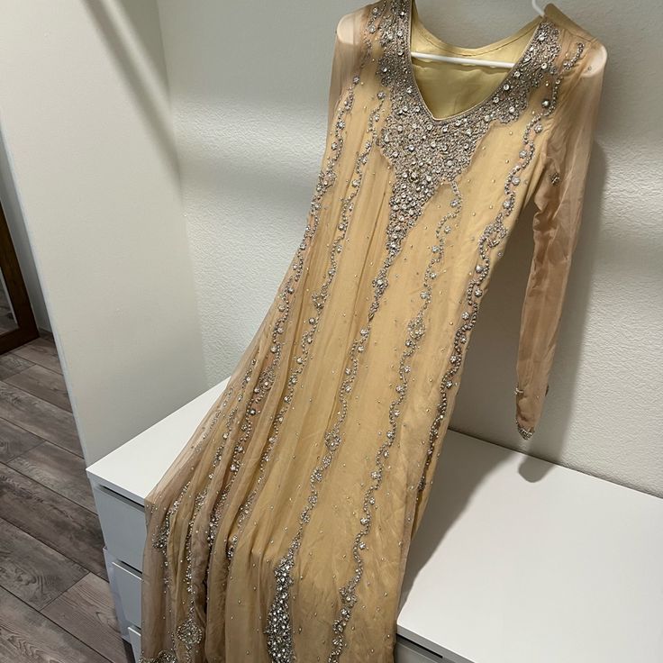 Formal Pakistani Designer Dress In Size Small (Us 2-4). One Piece Dress In Very Good Condition, Never Worn. Light Yellow/Beige Color. Pakistani Designer Dress, Yellow Beige, Pakistani Dress Design, Pakistani Designers, Designer Dress, One Piece Dress, Piece Dress, Light Yellow, Beige Color