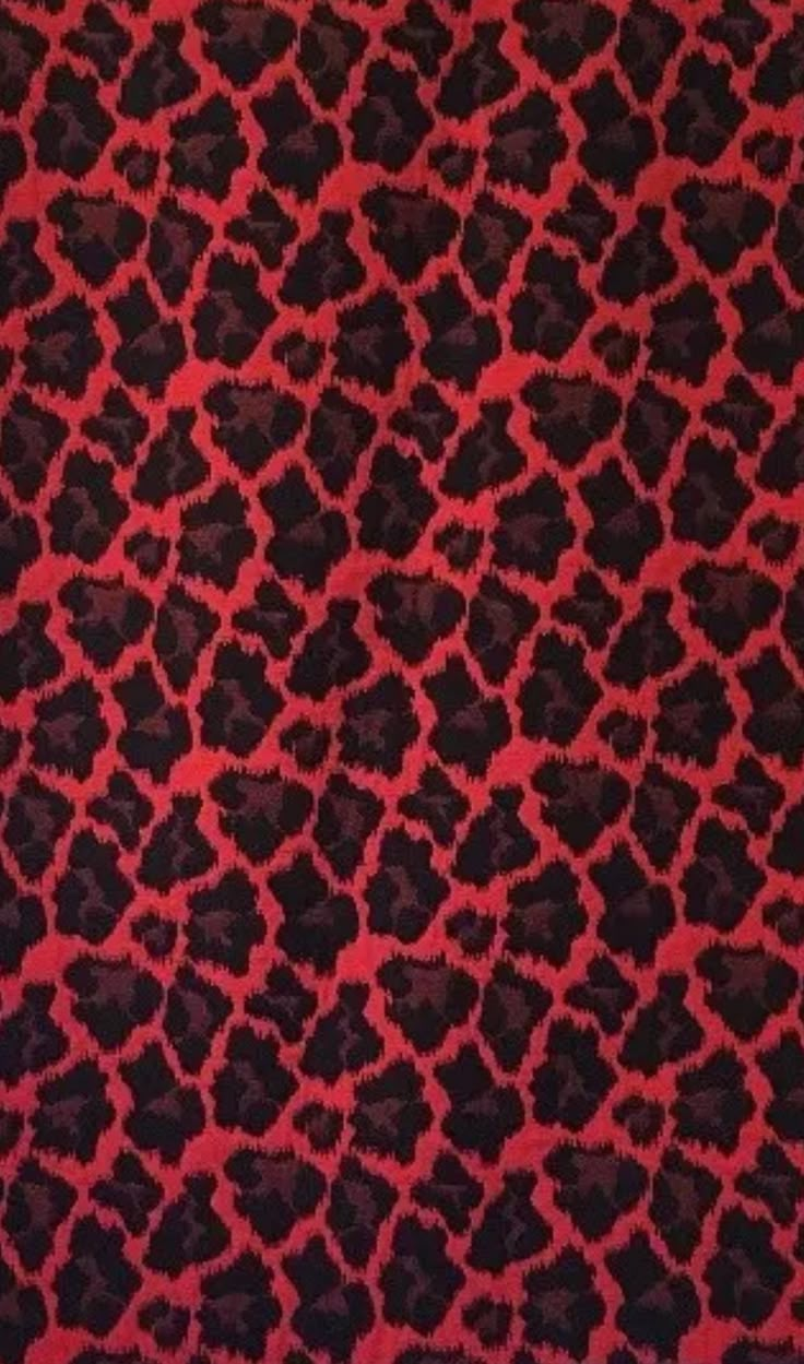 a red and black animal print fabric