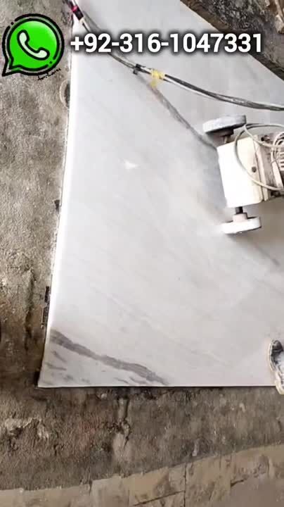 an aerial view of a man on a skateboard doing tricks