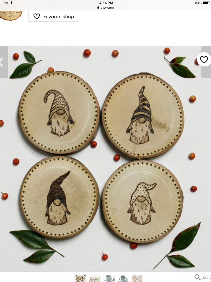 four small plates decorated with birds and hats