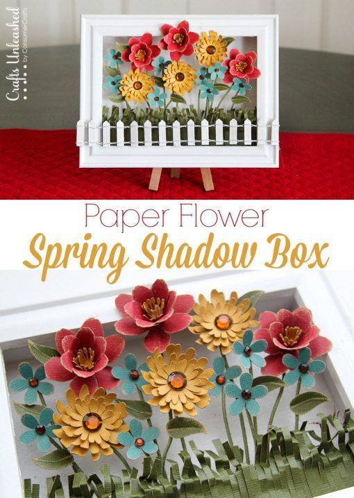 the paper flower spring shadow box is shown