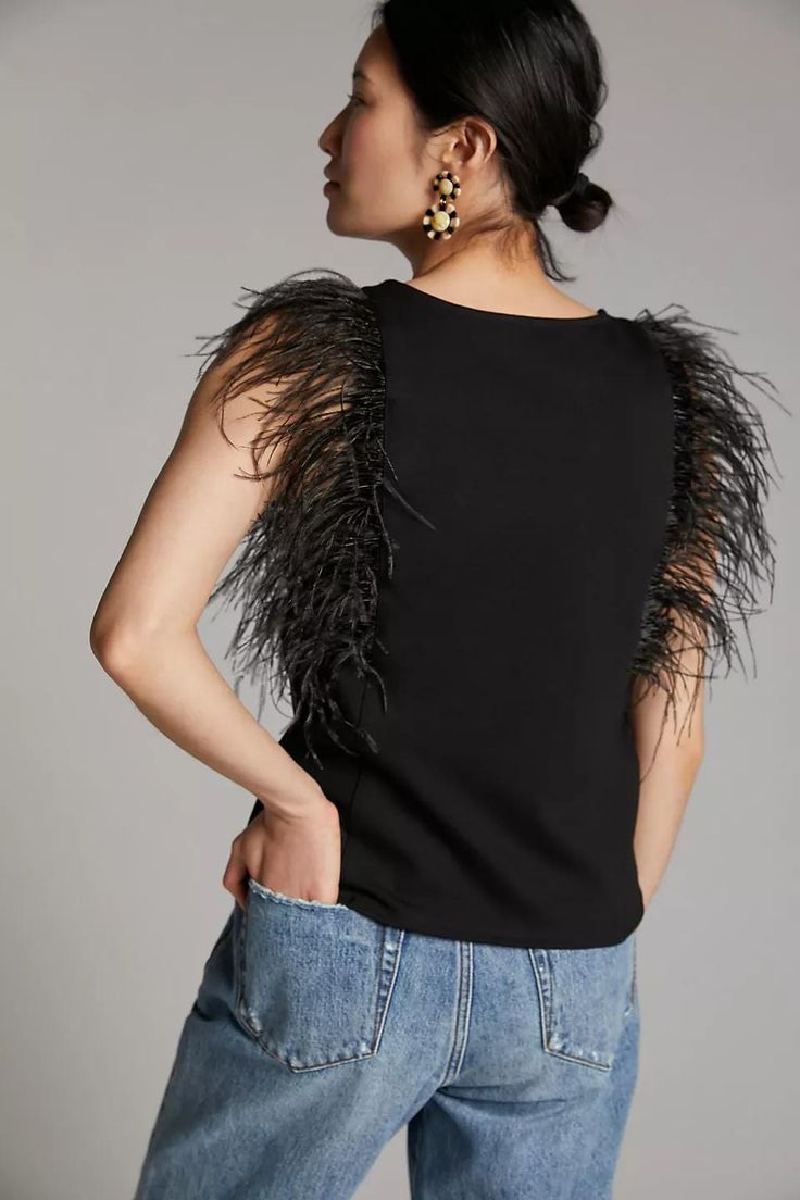 The season less black top you can wear forever. Lovely black crepe fabric with real sustainable sourced ostrich feathers. Key hole back neckline. 55% Viscose 45% Nylon Made in the USA Elegant Feathered Evening Tops, Chic Sleeveless Feathered Top, Spring Evening Tops With Feather Trim, Chic Evening Top With Feathers, Elegant Feather Tops For Summer, Feather Trim Tops For Fall Party, Fall Party Tops With Feather Trim, Chic Feathered Tops For Fall, Black Feather Trim Top For Evening