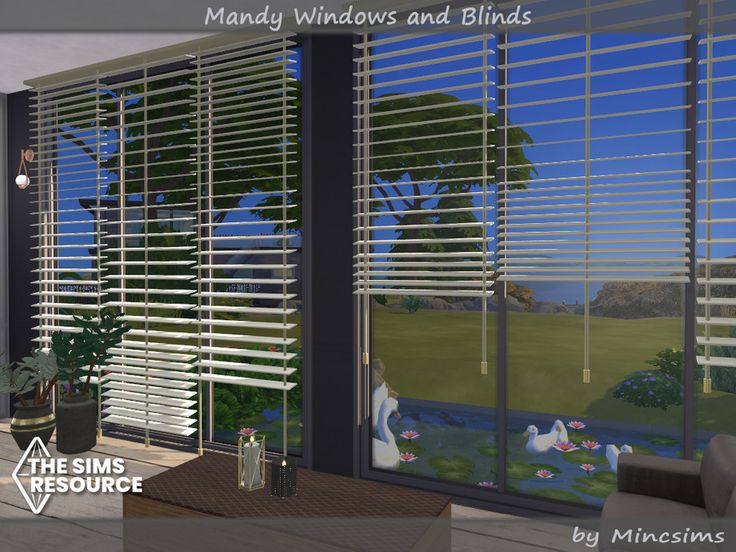 two windows with blinds open in front of a living room filled with furniture and plants