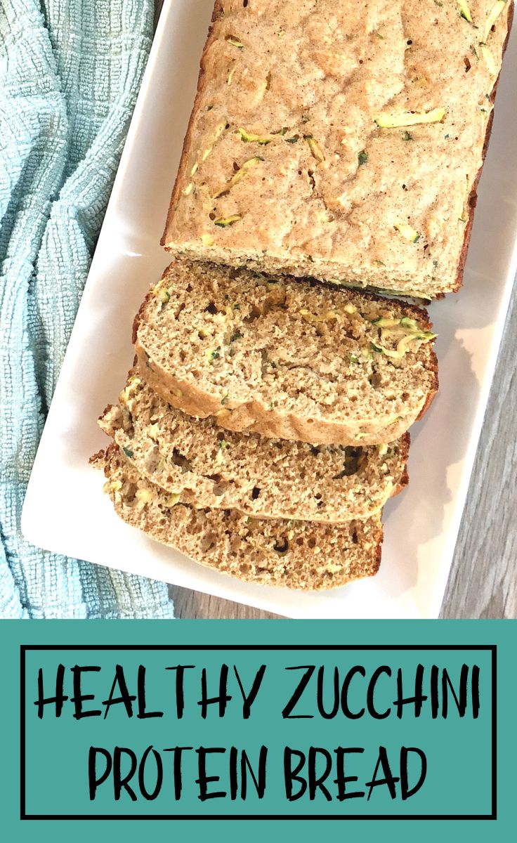 healthy zucchini protein bread on a white plate with text overlay that reads, heal thy zucchini protein bread