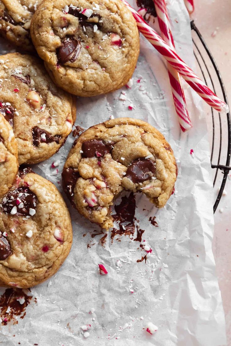 chocolate chip cookies with candy canes on the side