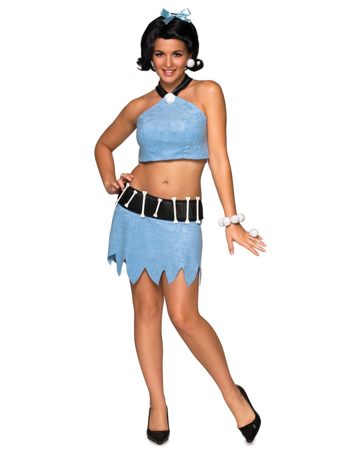 a woman in a blue costume posing for the camera with her hands on her hips