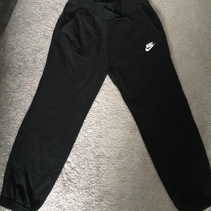 Brand New Never Worn Extra Small Black Cotton Capri Drawstring Nike Jogging Pants. Nike Black Sweatpants For Jogging, Nike Joggers With Elastic Waistband, Nike Casual Pants For Jogging, Casual Nike Pants For Jogging, Nike Black Sweatpants With Elastic Waistband, Nike Jogger Trousers For Loungewear, Nike Sweatpants For Loungewear, Casual Black Nike Sweatpants, Black Sweatpants For Jogging