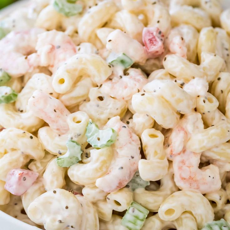 a white bowl filled with macaroni salad