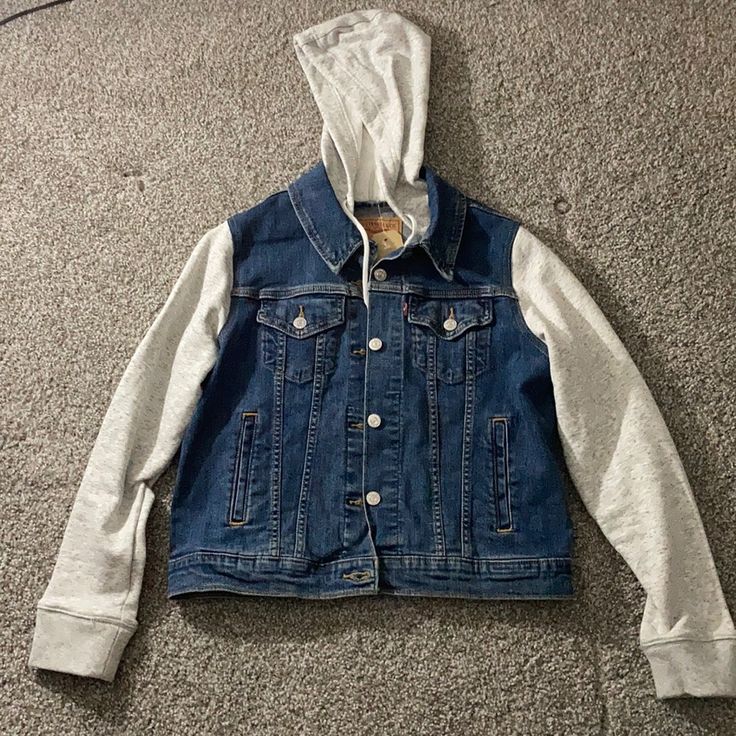 Jean Jacket With Gray Sleeves & Gray Hoodie. Never Worn Before. Levi's Hooded Spring Outerwear, Levi's Hooded Outerwear For Spring, Levi's Casual Hooded Outerwear, Levi's Casual Blue Outerwear, Casual Blue Levi's Outerwear, Levi's Casual Streetwear Outerwear, Dark Denim Shirt, Trucker Jacket Women, Levi Jean Jacket