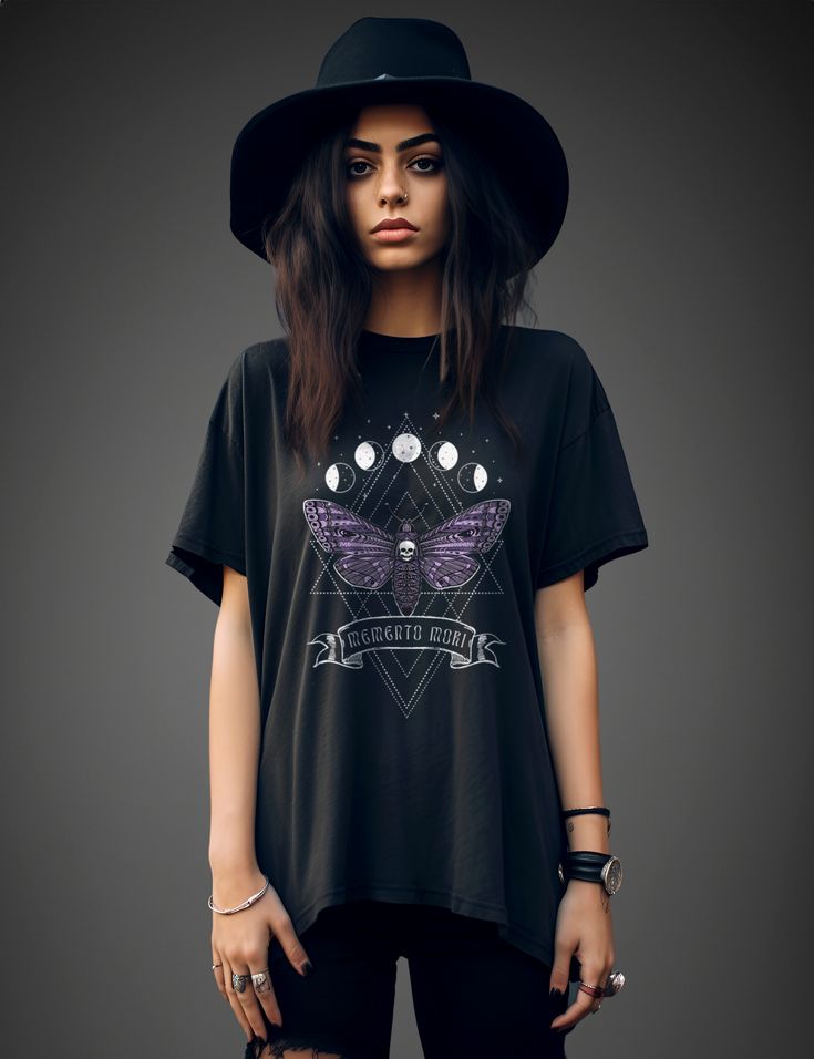 Memento Mori Witchy Aesthetic Moth Moon Phase Shirt Black Bohemian Top For Alternative Fashion, Black Bohemian Relaxed Fit Shirt, Mystical Black Top With Graphic Print, Mystical Black Tops With Graphic Print, Black Relaxed Fit T-shirt For Festivals, Mystical Short Sleeve Top With Graphic Print, Mystical Graphic Print Short Sleeve Top, Mystical Graphic Print Crew Neck Top, Black Moon Print Top For Festivals