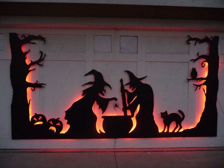 an image of halloween scene on the garage door