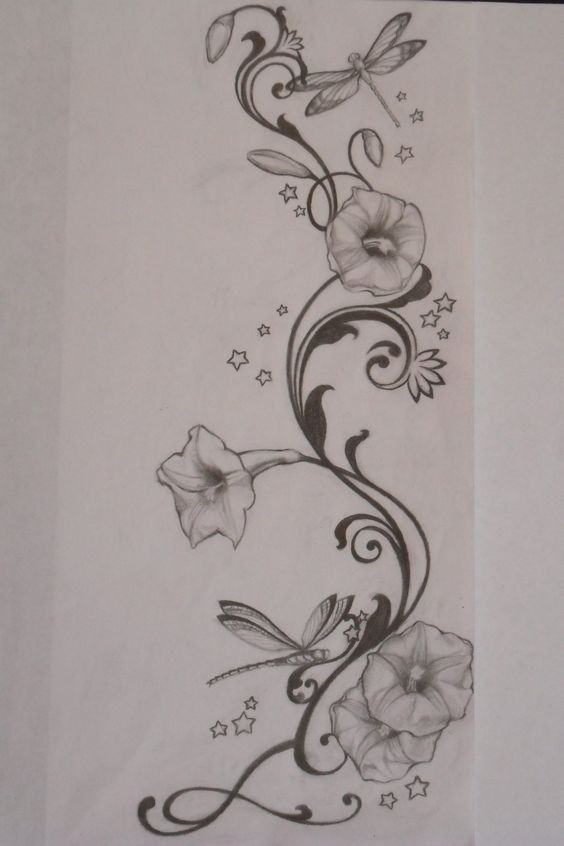 a tattoo design with flowers and butterflies on the side of a sheet of white paper