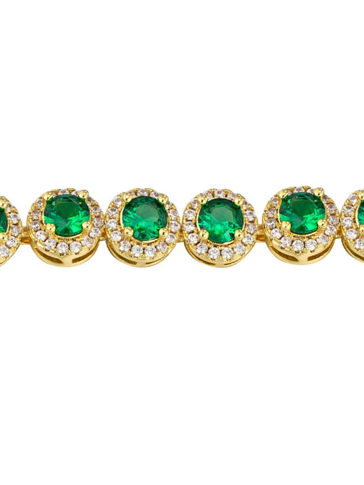 Zinnia Emerald Gold Bracelet The Zinnia Emerald Gold Bracelet is a perfect fusion of elegance and luxury. Featuring a delicate design and high-quality craftsmanship, this bracelet brings together vintage gold plating and dazzling emerald green stones, evoking a sense of timeless sophistication. It's an exquisite accessory that adds a touch of glamour to any outfit, whether for everyday wear or special occasions. The bracelet's hidden clasp ensures a seamless look, and the adjustable extension al Elegant Adjustable Green Gold Bracelet, Green Gold-plated Bangle, Elegant Green Round Chain Bracelet, Elegant Green Chain Bracelet As Gift, Elegant Green Chain Bracelet Gift, Green Emerald Jewelry With Jubilee Bracelet, Green Gold-plated Bracelet As Gift, Green Emerald Jubilee Bracelet Jewelry, Gold Emerald Tennis Bracelet As A Gift