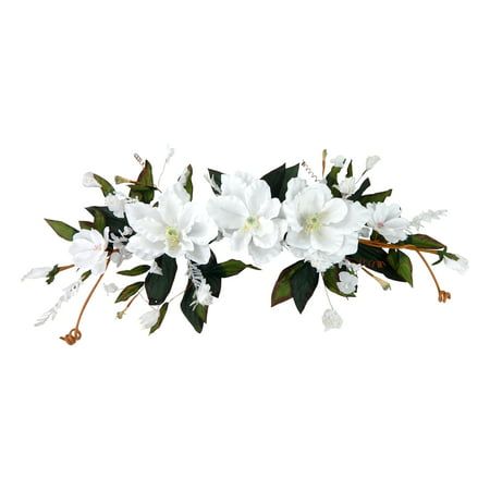 some white flowers and green leaves on a white background