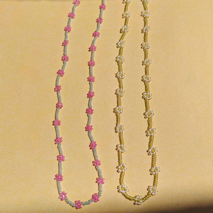 Florecitas translates to little flowers. A beaded necklace with tiny flowers. ~Blue, pink, and white tiny beads with gold-filled closing ~16" Length ~Made to Order *As Seen on LISA SAYS GAH* Adjustable Pink Flower Necklace With Colorful Beads, Pink Flower-shaped Necklaces With Colorful Beads, Pink Flower Necklaces With Colorful Beads, Pink Flower Necklaces With Tiny Beads, Pink Flower Necklace With Colorful Beads, Pink Flower-shaped Necklace With Tiny Beads, Pink Flower Necklace With Tiny Beads, Pink Flower-shaped Beaded Necklace With Beaded Chain, Dainty Flower Necklace With Tiny Beads