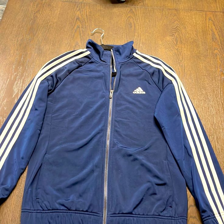 Brand New Navy Blue Adidas Track Jacket Size Medium Blue Spring Sports Outerwear, Adidas Navy Casual Track Jacket, Casual Adidas Navy Track Jacket, Casual Navy Adidas Track Jacket, Navy Adidas Long Sleeve Track Jacket, Adidas Navy Long Sleeve Track Jacket, Casual Blue Adidas Outerwear, Casual Blue Track Jacket For Fall, Navy Long Sleeve Track Jacket For Spring