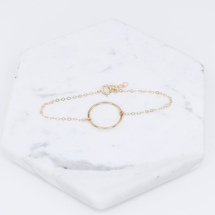 "14K karma gold bracelet - Solid Gold Bracelet, 14k delicate bracelet ★ Circle charm is 14k solid gold, it is about 17mm ★ The chain and all components are 14K solid yellow gold It comes with a 1/2\" extension chain. (If you order a 6\" bracelet, it will be a 6\" bracelet plus 1/2\" extension.) Please read our policies before you place your order. https://www.etsy.com/shop/SashJewelry/policy?ref=shopinfo_policies_leftnav To see other Mother daughter necklace set click here: https://www.etsy.com/ Gold Circle Bracelets For Everyday, Dainty Adjustable Circle Bracelets, Gold-tone Round Gold Bracelet With Solid Link, Adjustable Gold Circle Bracelets, Gold-tone Solid Link Round Bracelet, Mother Daughter Necklaces Set, Other Mother, Karma Bracelet, Mother Daughter Necklace