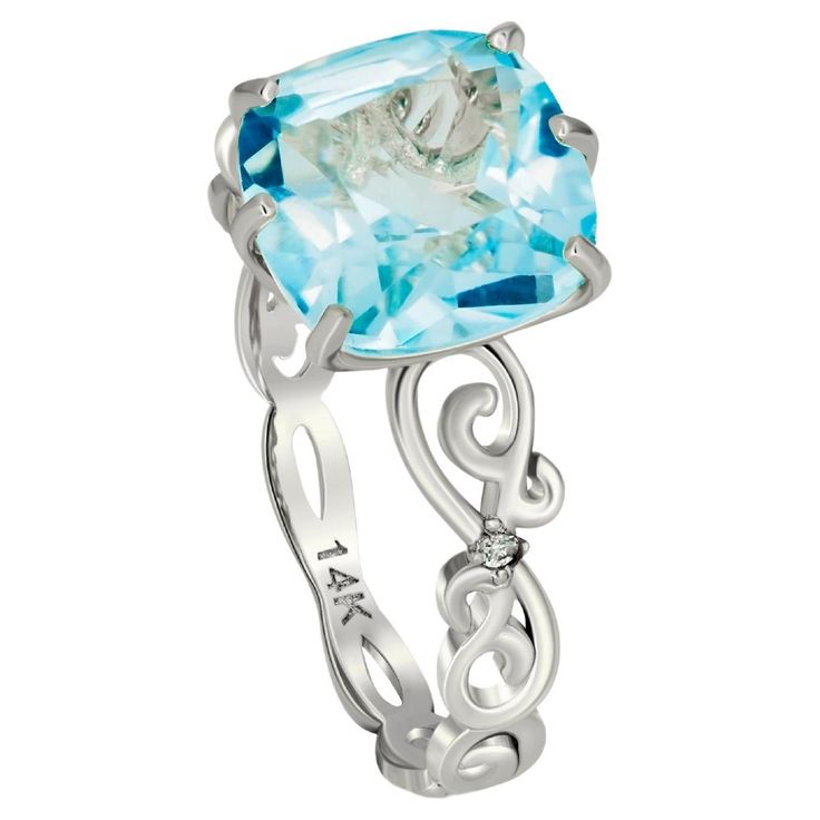 14 k solid gold ring with natural topaz and diamonds. November birthstone. Weight: 2.20 g. depends from size Central stone: Natural topaz Cushion cut, weight - approx 3.00 ct. in total, color - blue Clarity: Transparent with inclusions Surrounding stones: Diamonds: 0.02 ct (2 pieces x 0.01 ct), G/VS, round brilliant cut. White Gold Topaz Ring With Gemstone Accents, Blue Topaz Birthstone Diamond Ring, Gift Diamond Topaz Ring With Gemstone Accents, Diamond Topaz Ring With Gemstone Accents For Gift, Gift Topaz Ring With Diamond And Gemstone Accents, Diamond-accented Topaz Ring As A Gift, White Gold Topaz Ring With Gemstone Accents For Anniversary, White Gold Topaz Ring With Diamond And Gemstone Accents, White Gold Topaz Gemstone Ring