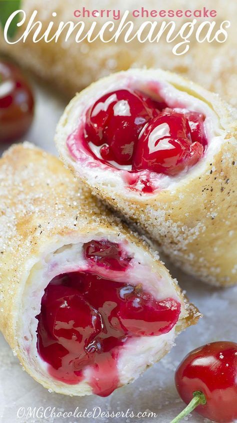 cherry cheesecake chinnichangas with powdered sugar and cherries on top