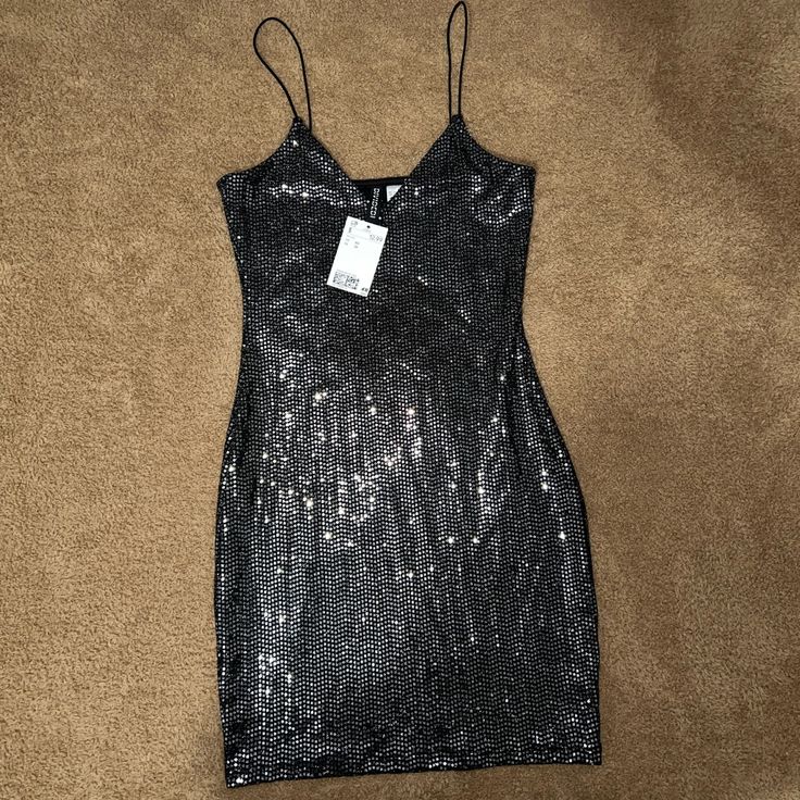 H&M Bodycon Sparkly Dress Nwt Silver Sequined Mini Bodycon Dress, Silver Sequined Mini Length Bodycon Dress, Silver Sequin Mini Dress For Club, Silver Bodycon Mini Dress For Evening, Silver Mini Sequin Dress For Club, Silver Bodycon Mini Dress For Night Out, Silver Sleeveless Bodycon Dress For Date Night, Silver Mini Length Sequin Dress For Club, Sleeveless Silver Bodycon Dress For Date Night