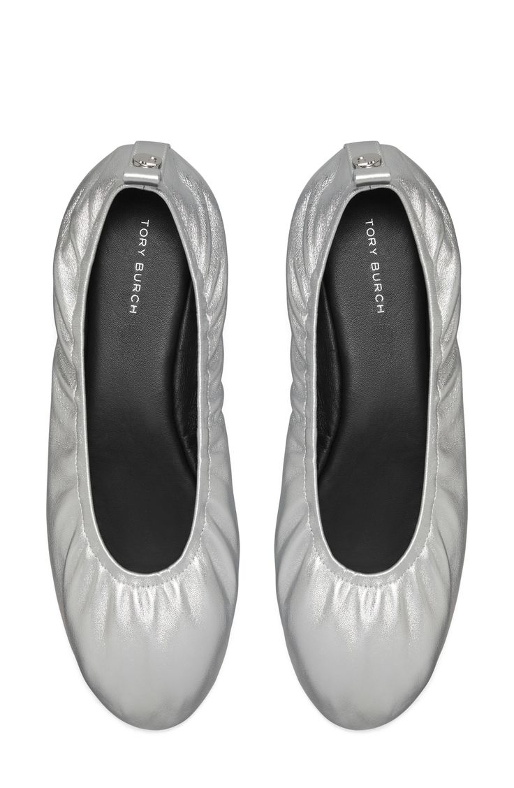 Complete your look with the effortless sophistication of a classic ballet flat with a stunning metallic finish. Leather upper and lining/synthetic sole Imported Sleek Evening Slip-on Ballet Flats, Silver Ballet Flats For Evening, Silver Round Toe Ballet Flats For Evening, Silver Evening Ballet Flats, Silver Leather Ballet Flats For Evening, Chic Silver Ballet Flats, Chic Silver Closed Toe Ballet Flats, Elegant Silver Ballet Flats, Silver Leather Slip-on Ballet Flats