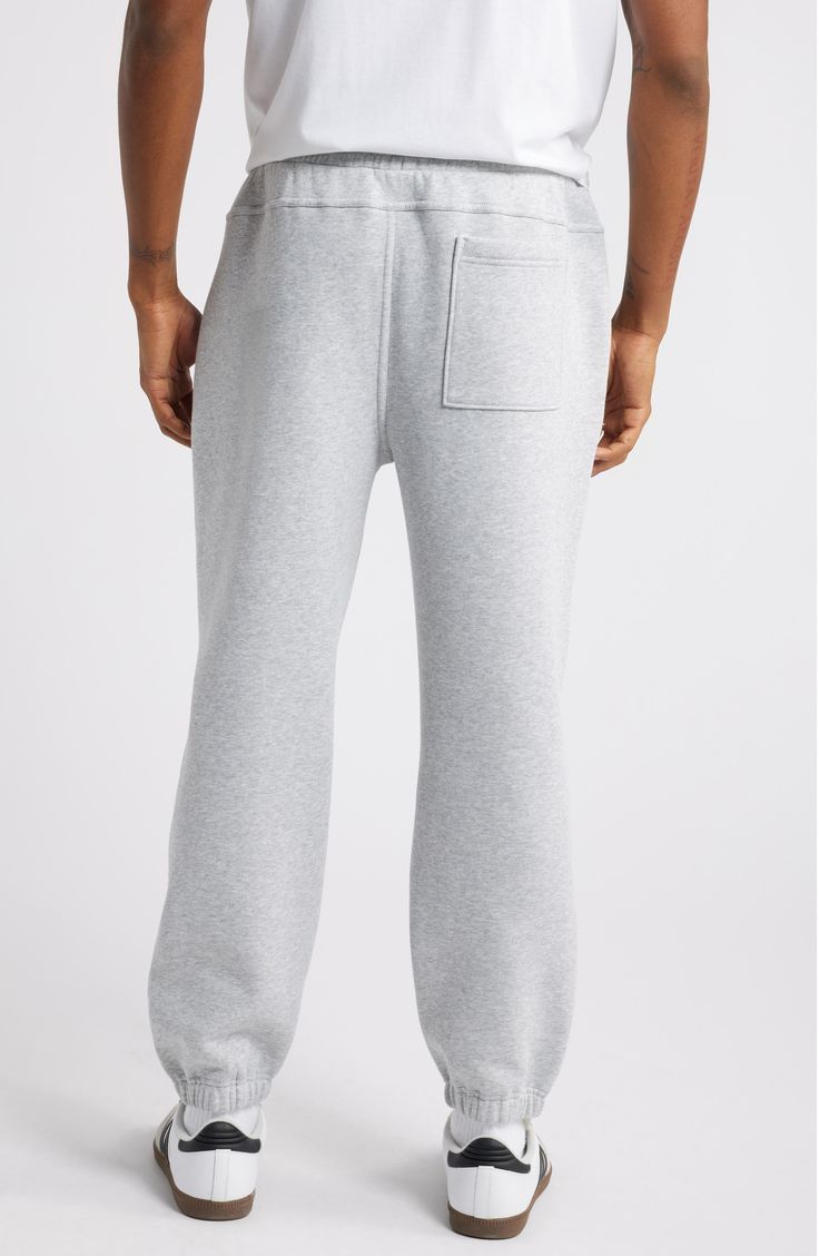 Made from soft cotton-blend fleece, these classic joggers are your go-to pair for lounging, the gym or the street. 27" inseam; 10" leg opening; 12 1/2" front rise; 15" back rise (size Medium) Elastic/drawstring waist Side-seam pockets; back patch pocket 70% cotton, 30% polyester Machine wash, tumble dry Imported Not available for sale and shipment to Germany Winter Joggers With Comfort Waistband For Lounging, Basic Sweatpants With Comfort Waistband For Loungewear, Basic Sweatpants With Ribbed Waistband In Relaxed Fit, Cozy Fit Comfortable Sweatpants With Comfort Waistband, Basic Sweatpants With Comfort Waistband, Basic Sweatpants With Ribbed Waistband And Relaxed Fit, Comfortable Fleece Joggers For Lounging, Casual Joggers With Comfort Waistband For Lounging, Casual Sweatpants For Lounging