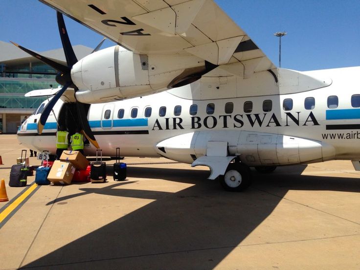 an air botswanna airplane is parked on the tarmac