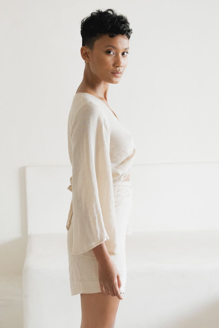 Twist it, tie it, make a loose bow or wear it off shoulder - options are endless with our sensual, multiple style Ramie Wrap Top. This top features a flowy, bell shaped full-length sleeve, and wrap tie waist which gives an ever so soft and feminine silhouette tailored to your unique body shape. Ramie is a smooth and quick drying natural fiber first used in ancient Egyptian times, and in Europe during the Middle Ages - so it’s safe to say it has stood the test of time. We love Ramie because of it Soft And Feminine, Fiber One, The Middle Ages, Feminine Silhouette, Made Clothing, Wrap Top, Middle Ages, Body Shape, Ancient Egyptian