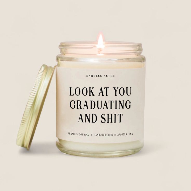 DescriptionThe Look At You Graduating and Sh*t Candle features: Reusable, apothecary-inspired glass jar with a brushed gold lid Off-white label with black text Natural soy wax, eco-friendly cotton wick, high-quality essential or fragrance oils Burn time up to 50 hours Hand-poured & designed in California in small batches Scent: Golden Hour Size8 oz: 2.75" x 3.50"About the BrandEndless Aster is your ultimate destination for candles that don't just hit the mark; they totally smash it. Started by a Kids Accessories Jewelry, Face Lotion, Candles Crafts, Main Event, Valentines Day Weddings, Fragrance Oils, Cleanser And Toner, Facial Oil, White Label