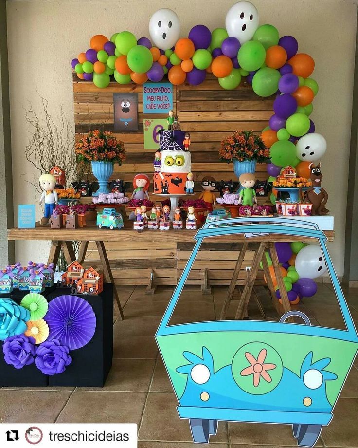 an image of a birthday party with balloons and decorations