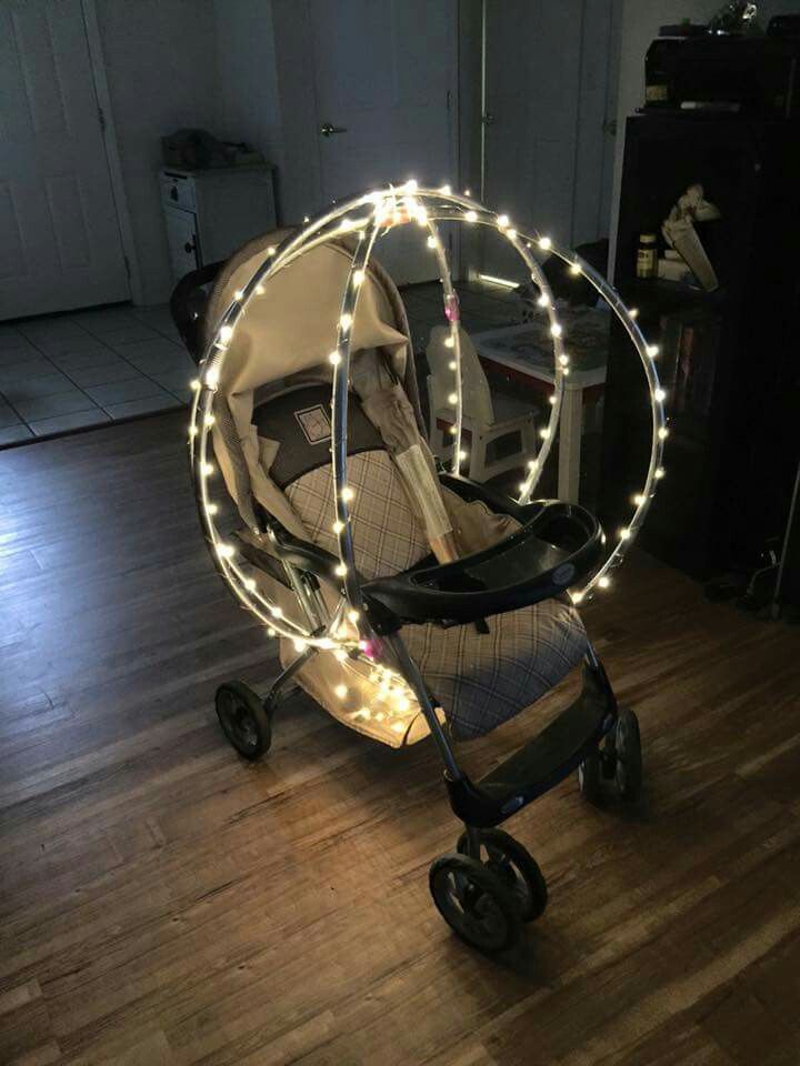 a stroller with lights in the middle of it