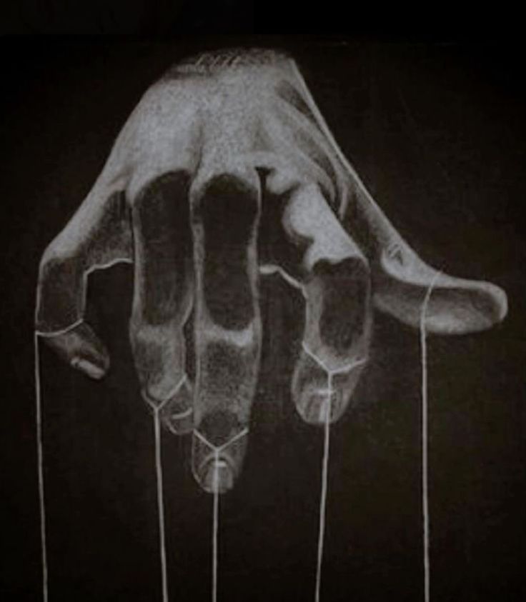 a black and white drawing of a hand reaching out from the ground with string attached to it