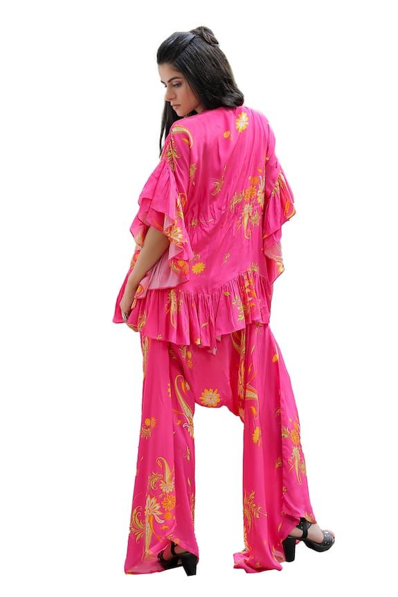 Pink kurta with mirror and shell embroidered neckline and floral print. Paired with a matching dhoti style pant. - Aza Fashions Bohemian Silk Palazzo Set For Summer, Bohemian Palazzo Set For Summer, Summer Palazzo Set With Ruffles, Bohemian Silk Sets For Summer, Summer Beach Silk Set, Pink Kurta, Kurta Pant Set, Style Pant, Tunic Pattern