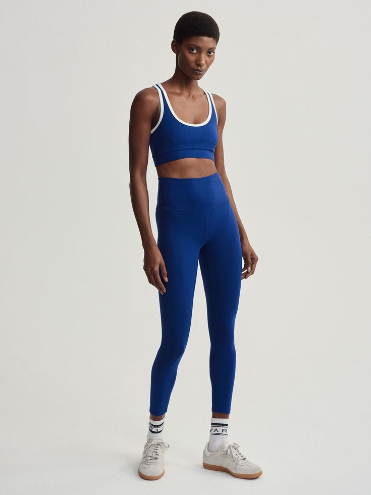 Made in our Move fabric for moisture management and breathability, this bra is perfect for everything from yoga to Pilates. Removable cups allow you to personalise the fit, while a contrast trim adds a unique finish. Blue Athleisure Activewear, Bra Friendly, Spring Blue Activewear With Built-in Bra, White Activewear, Blue Compressive Sports Bra, Blue Compressive Activewear With Built-in Bra, Blue Sleeveless Activewear With Built-in Bra, Cozy Boots, School Collection, Home Sport