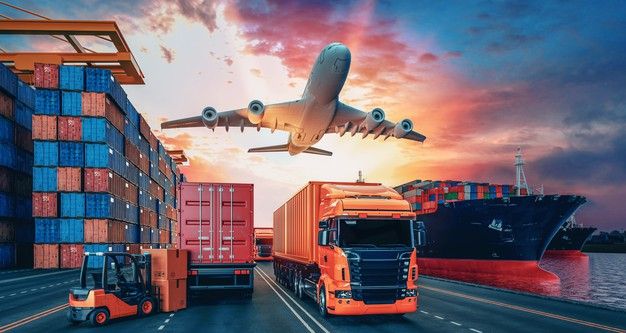 an airplane is flying over shipping containers on the road with a truck and forklift