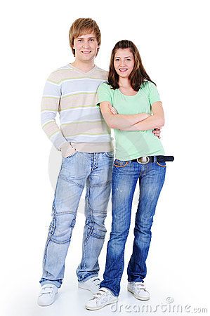 two people standing next to each other with their arms crossed