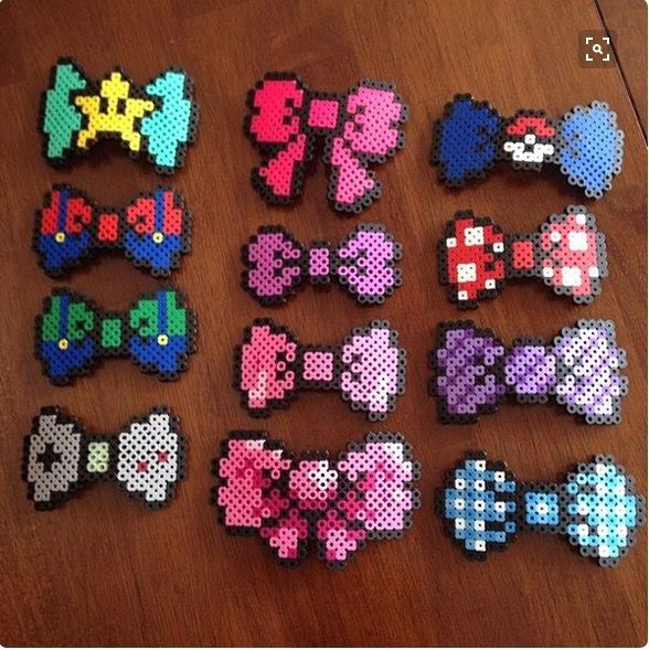 several different types of bow ties on a table