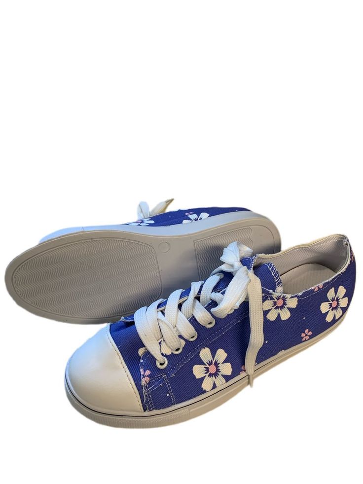 Periwinkle Daisy Canvas Sneakers – Just Your Average Gal Comfortable Non-slip Spring Canvas Shoes, White Slip-on Canvas Shoes With Rubber Toe Cap, Non-slip Lace-up Spring Canvas Shoes, Non-slip Lace-up Canvas Shoes For Spring, Blue Round Toe Canvas Shoes, Blue Canvas Shoes With Round Toe, Casual Slip-on Canvas Shoes With Rubber Toe Cap, Non-slip Low-top Canvas Shoes For Summer, Spring Lace-up Canvas Shoes