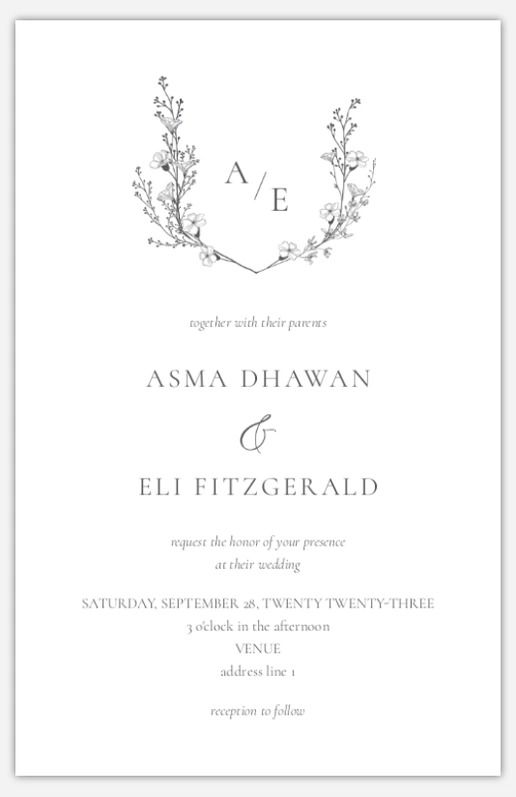 the wedding card is shown in black and white, with an elegant monogrammed design