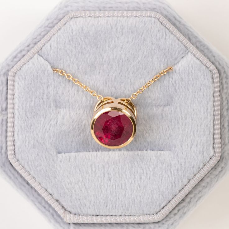 14K Solid Gold Ruby Floating Pendant,Solitaire Bezel Set Necklace,Red Gemstone Minimalist Pendant,Wedding Gift,Dainty Necklace for Daughter ★ ★ CUSTOM/DUTY-FREE SHIPPING WORLDWIDE, BUYERS DON'T HAVE TO PAY ANY CUSTOM FEES WHILE IMPORTING ★ ★ Details Made to order Material: 14k/18k Gold Color Options: Yellow Gold, White Gold, Rose Gold, ★ Center Stone: Ruby, Round Size: 8MM ★If you choose to buy the Solid Gold Chain with the pendants, it is adjustable for 14 inches, 16 inches, and 18 inches. ★ 10 Ruby Round Pendant Wedding Jewelry, Ruby Round Pendant Jewelry For Wedding, Ruby Round Pendant For Wedding, Wedding Ruby Round Pendant Jewelry, Fine Jewelry Solitaire Gemstone Necklace For Wedding, Solitaire Birthstone Necklace For Anniversary, Round Pendant, Solitaire Birthstone Necklace For Anniversary, Wedding Solitaire Bezel Pendant Necklace, Wedding Necklace With Bezel Setting And Round Cut